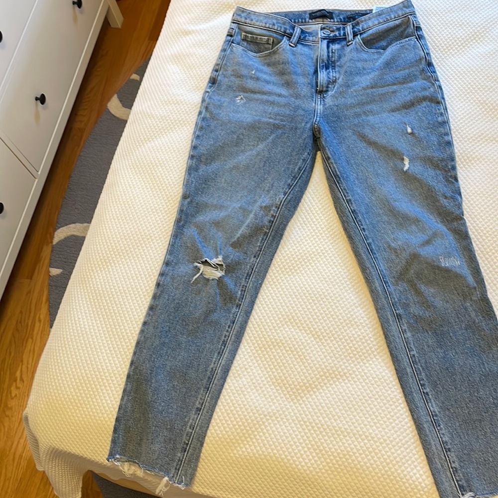 Banana Republic, high rise slim ankle jeans. Size 29. Distressed. 27” inseam.